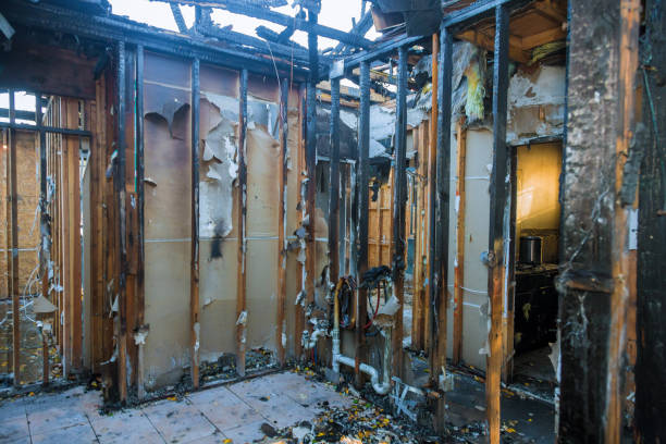 Professional Fire Damage Restoration technician working in Athens, OH